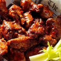 Sweet & Spicy Chicken Wings · Sweet chili sauce, scallions, sesame seeds and celery.