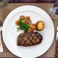 Third Ave Club Steak · 16 oz bone-in new York strip - dry aged in house and brandy peppercorn sauce. Served with tw...