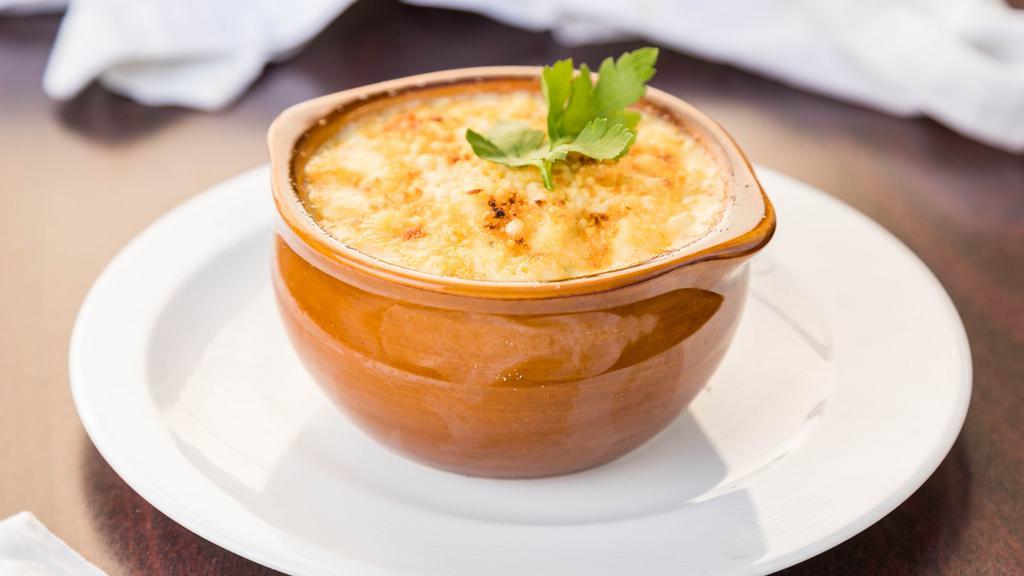 Truffled Mac & Cheese · Onions, parsley, cream, fontina, brie and cheddar cheeses and breadcrumbs.