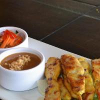 Chicken Satay (6). · Hand made Chicken Satay, perfectly marinated and pan grilled served with peanut sauce and cu...