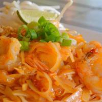 Pad Thai · Thin rice noodles, stir fried with eggs, green onions, bean sprouts topped with ground peanu...