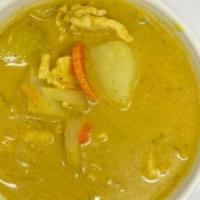 Yellow Curry · Choice of protein simmered in our in-house yellow curry sauce with potatoes, carrots and swe...