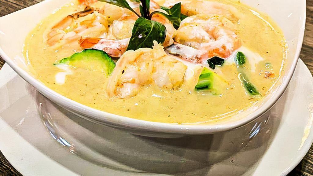 Green Curry · Choice of protein simmered in green curry sauce with bamboo shoots, green beans, zucchini, bell peppers, basil and fried eggplants topped with coconut milk