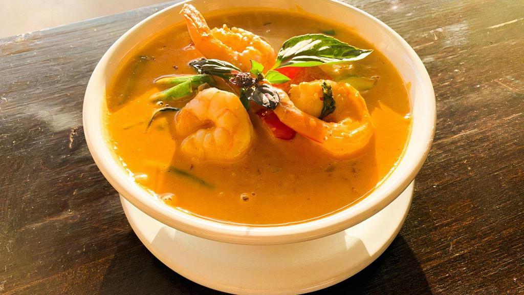 Panang Curry · Choice of protein simmered in peanut curry with green beans, carrot, bell peppers, basil, kaffir leaves, topped with coconut milk