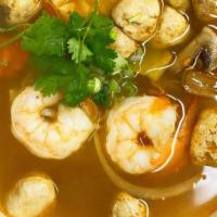 Tom Yum Soup · Hot n sour soup with kaffir leaves, lemongrass, cabbage, onion, tomato and mushroom