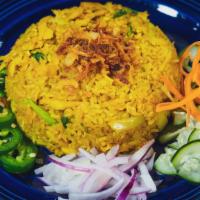 Curry Fried Rice · Fried rice with egg, onion in yellow chili powder. Serve with jalapeno, red onion, shallot o...
