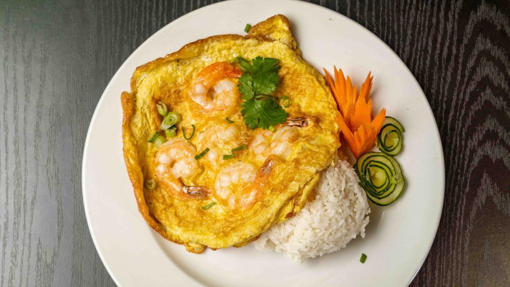 Thai Omelette with Shrimp · Thai style omelette with shrimp over rice