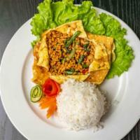 Thai Omelette Wrapped Basil Grounded Chicken · Thai style omelette wrapped basil grounded chicken, serve with rice

Please be specific: not...