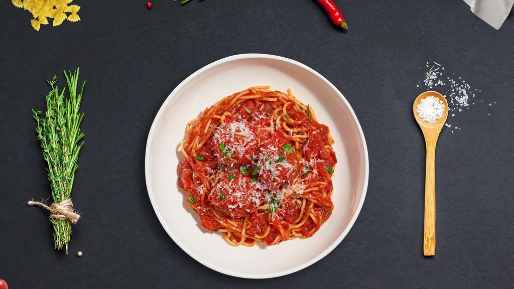 Spaghetti With A Chance of Meatballs · Spaghetti and homemade ground beef meatballs served with red sauce, red pepper flakes, and parmesan.
