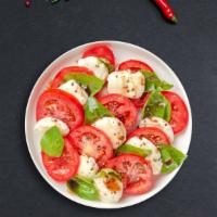 Care For Caprese Salad · Fresh mozzarella, tomato, basil, balsamic vinegar, and olive oil.