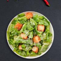 Classic Caesar Salad · Romaine lettuce, croutons, fresh parmesan cheese, and Caesar dressing.