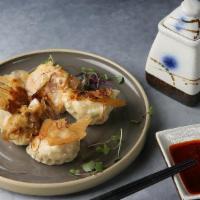 Pan Fried Seafood Pot Stickers (5) · Scallop, Shrimp, Crab Meat