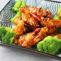 Sesame Chicken · Breaded Crispy Fried Chicken Breast with House Special Sesame Sauce (Mild Spicy)