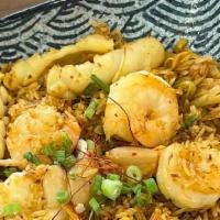 Kimchi Seafood Fried Rice · Stir Fried Shrimp, Squid, Chicken Breast, Kimchi, Egg, Onion & Rice