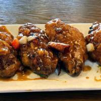 General Tso's Chicken Wings · Breaded Crispy Fried Chicken Wings with Sweet & Spicy Sauce