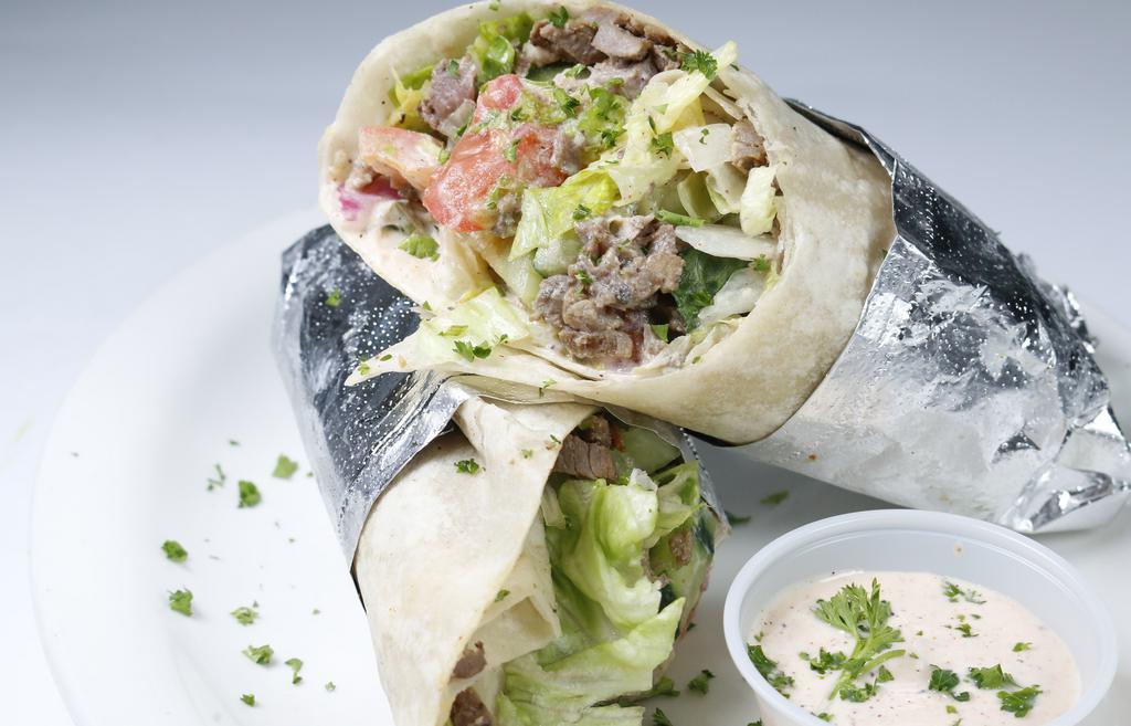 Lamb & Beef Gyros · Slow cooked, thinly sliced marinated lamb & beef