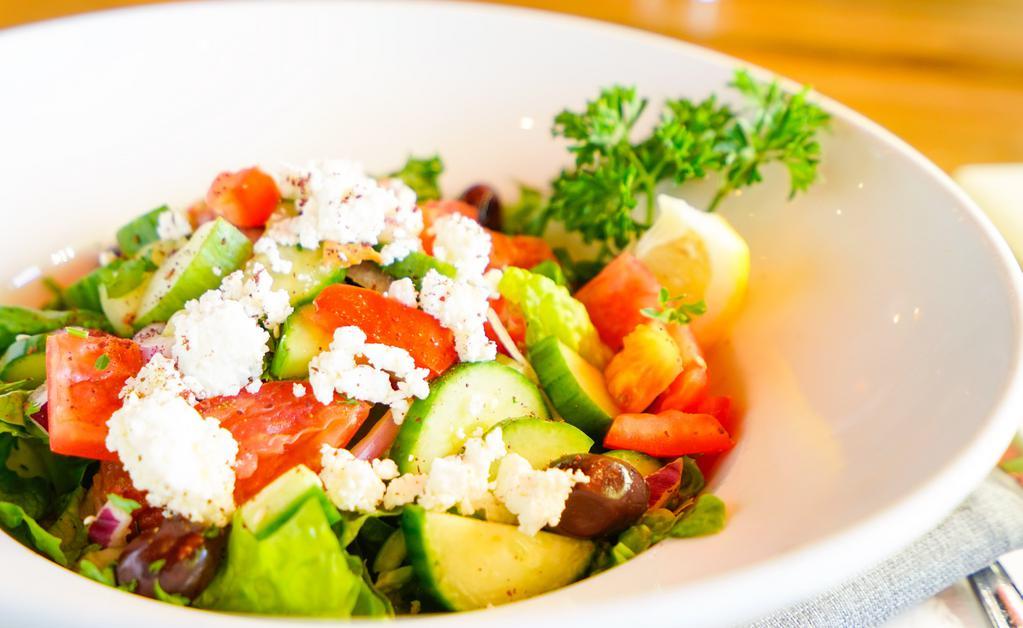 Greek Salad · Vegetarian, gluten free. Romaine lettuce, tomato, cucumber, red onion, bell peppers, Kalamata olives, house dressing.