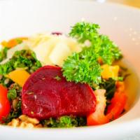Kale Salad · Vegetarian, gluten free. Quinoa, roasted beets, shaved almonds, tomato, sliced oranges, parm...
