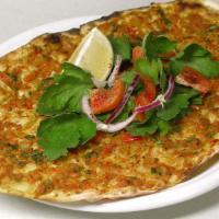 Lahmacun (Turkish Pizza) · Thin crusted flat bread with minced meat, veggies, herbs & spices. (2 pieces)