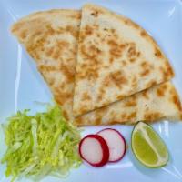 Quesadilla (Solo Queso) · Large flour tortilla with cheese.