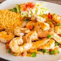 Camarones Rancheros · Grilled shrimp sautéed with bell peppers, onion, tomato and serrano peppers.