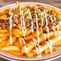 Meaty Fries · Choice of meat, melted Monterey cheddar and Monterey Jack cheese, onion, cilantro, salsa and...