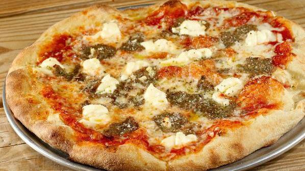 Meatball & Ricotta Pizza · Tomato sauce, shredded mozzarella, sliced meatballs, fresh garlic, ricotta cheese, oregano, Romano and garlic oil on a thin crust.