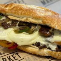 Philly Cheesesteak Sandwich · Choice of beef or chicken, caramelized onions and cherry hot peppers with provolone cheese o...