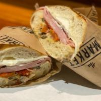 Italian Sandwich · Genoa salami, mortadella, provolone cheese, roasted tomatoes, mayo and antipasti spread (art...