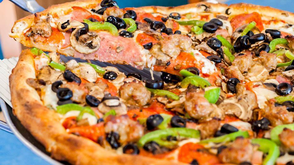 Combination Pizza · Salami, pepperoni, ham, bell peppers, olives, mushrooms, and sausage.