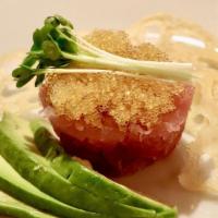 Tuna Tartar Appetizer · Big eye tuna doused in a specially prepared spicy sesame sauce, garnished with tobiko and av...