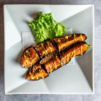 Nasu Dengaku · Fried eggplant, sweet miso sauce and kurogoma. Vegetarian.