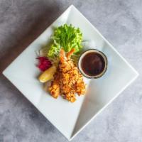 Ebi Almond Age (3pc) · Deep fried almond covered shrimp served with dipping sauce.