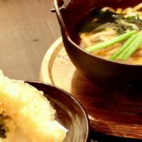 Nabeyaki Udon · Udon noodles with shrimp and vegetable tempura, fishcake, egg and vegetables.