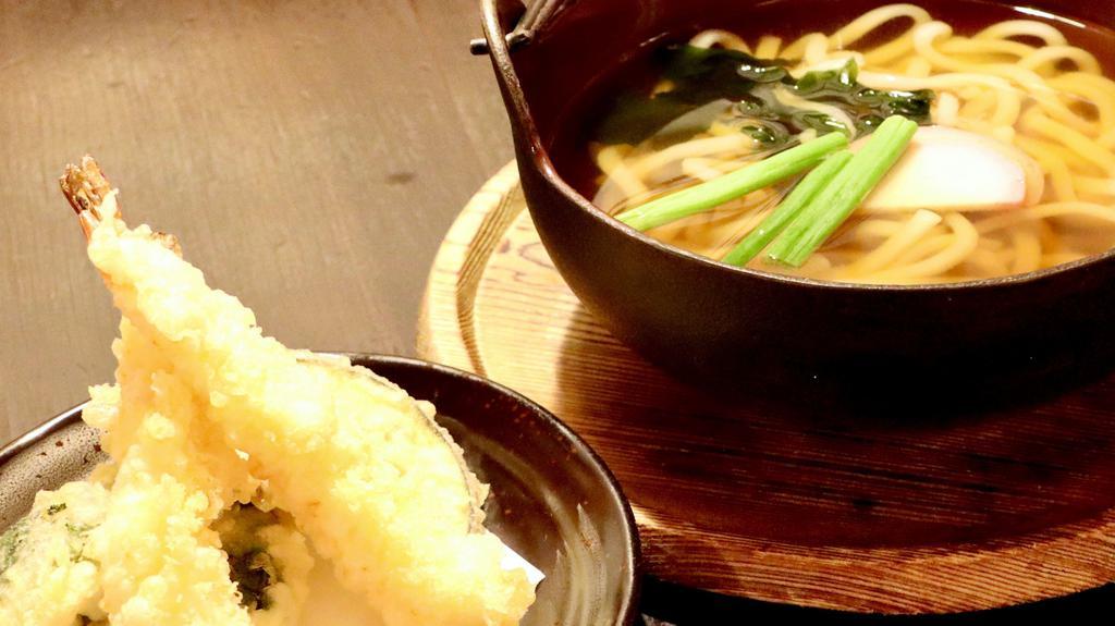 Nabeyaki Udon · Udon noodles with shrimp and vegetable tempura, fishcake, egg and vegetables.