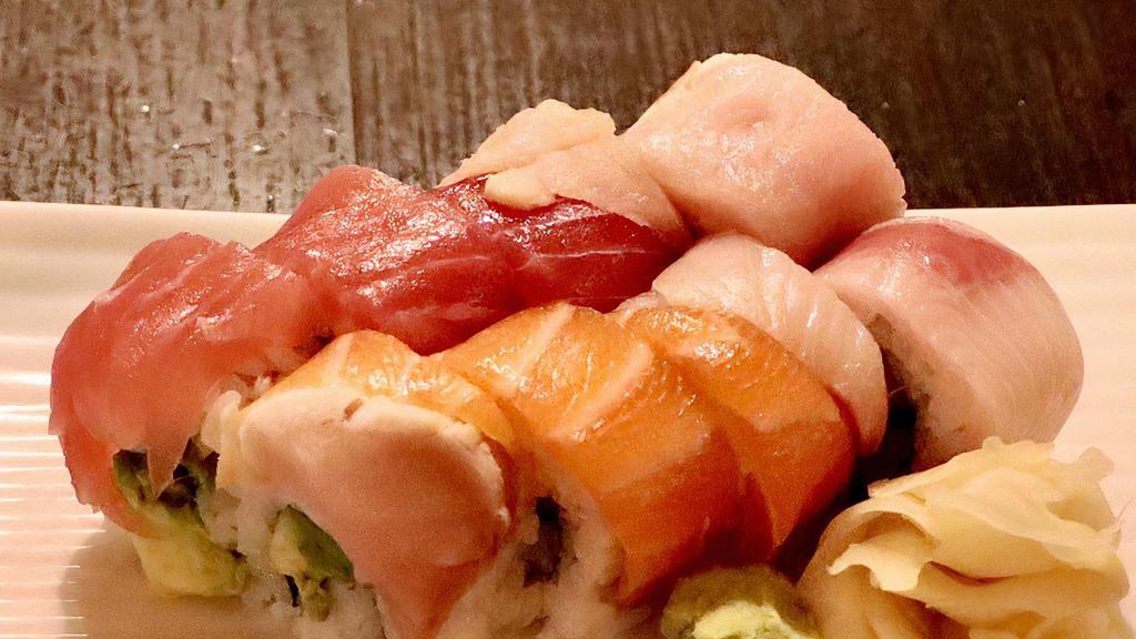 Rainbow Roll (8pc) · Tuna, salmon, shrimp and yellowtail rolled with avocado and cucumber (8 pcs) gluten-free.