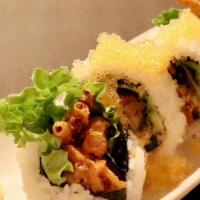 Spider Roll (4pc) · Deep fried soft shell crab rolled with avocado and lettuce topped with tobiko (4 pcs).