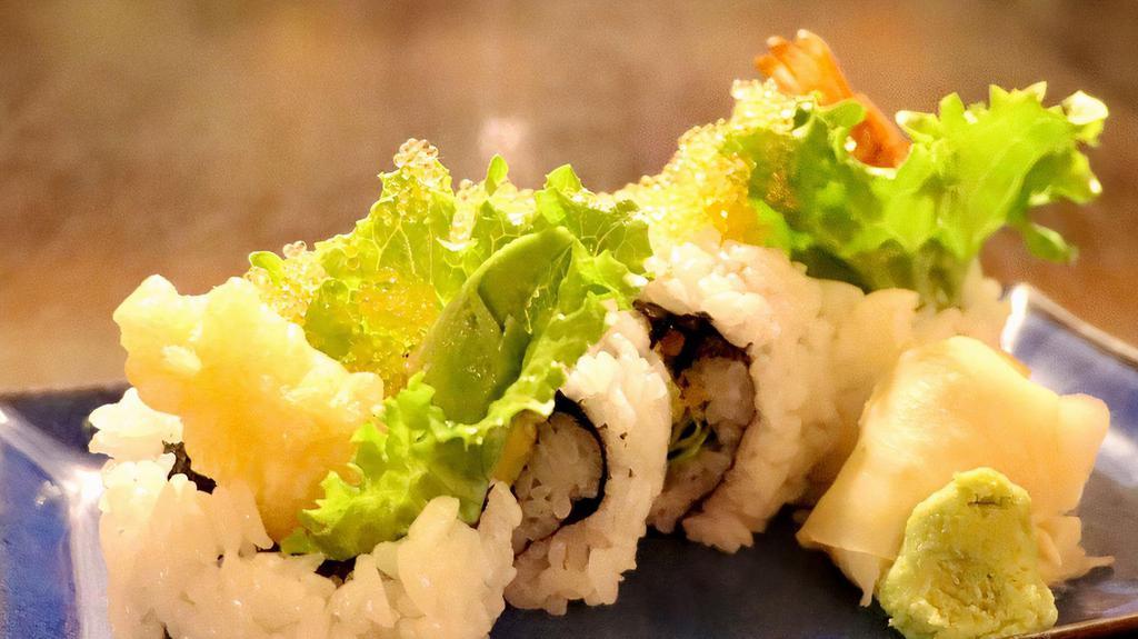 Ebi Tempura Roll (4pc) · Shrimp tempura rolled with avocado and lettuce topped with tobiko (4 pcs.)
