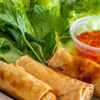 Eggs Rolls · 3 pork Egg rolls with Salad and cuccumbers, and house special sauce, and little chili.