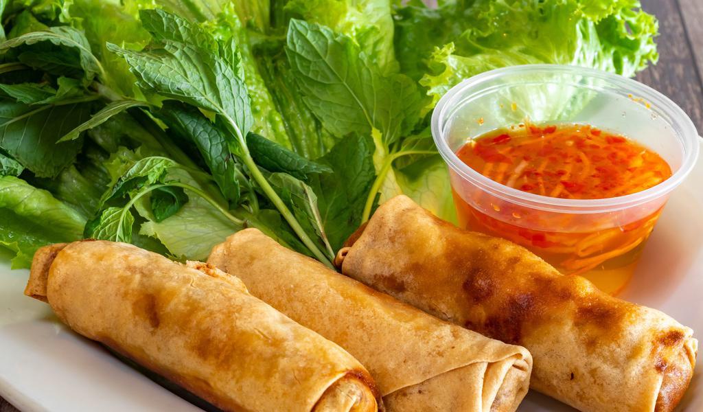 Eggs Rolls · 3 pork Egg rolls with Salad and cuccumbers, and house special sauce, and little chili.