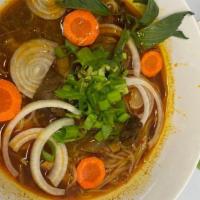 Vietnamese Braised Beef Stew Soup- Bo Kho · pot-roasted beef stew, fragrant with lemongrass, star anise and cinnamon. with a choice of R...