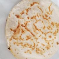 Quesadilla · Two small flour tortillas with melted cheese.