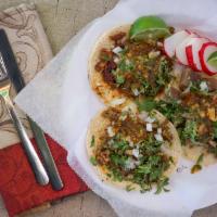 Taco Mexicano · Soft corn tortilla with meat, onions, cilantro and salsa.