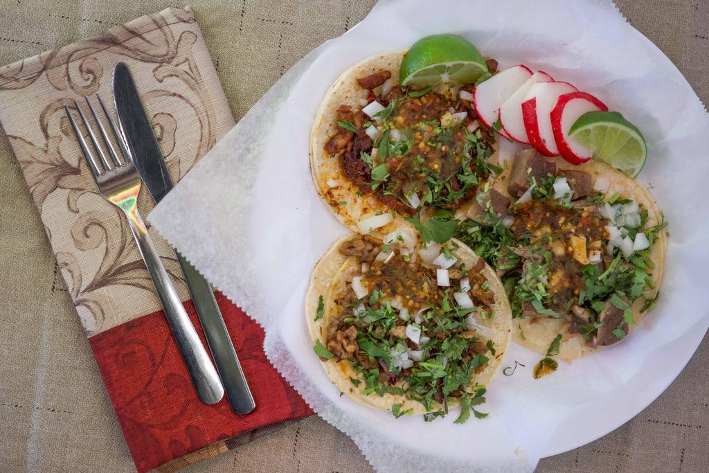 Taco Mexicano · Soft corn tortilla with meat, onions, cilantro and salsa.
