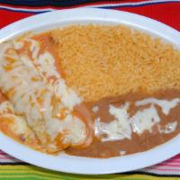 Taco or Enchilada Plate · Includes one taco or enchilada with rice and re-fried beans and cheese.