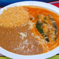 Chile Relleno Plate · Chile relleno served with rice, re-fried beans and cheese.