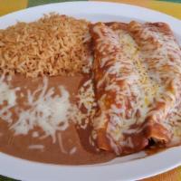Enchilada Marinas Plate · Rice, Refried Beans, 2 enchiladas stuffed with shimp, pico de gallo topped with red salsa an...