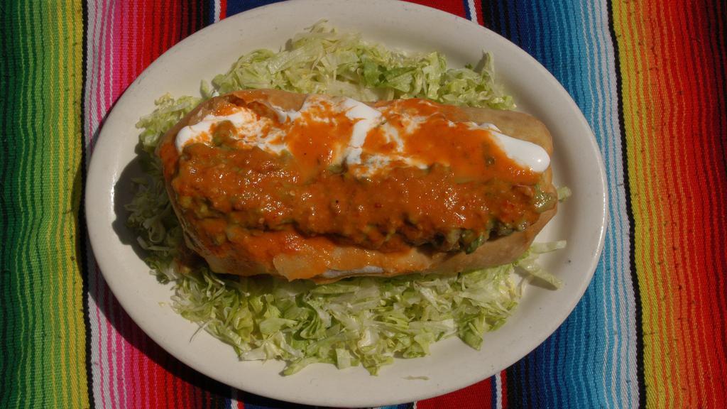 Chimichanga · Deep fried burrito. Choice of meat with rice and beans topped with guacamole and sour cream.