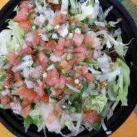 Regular Burrito Bowl · whole pinto beans, rice, your choice of meat topped with lettuce, pico de gallo and avocado ...