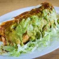 Veggie  Chimichanga · Deep fried burrito with rice, beans, cheese, topped with guacamole, sour cream and tomatillo...